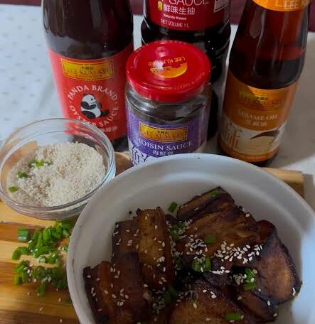 Pork belly stirfry with sesame seeds on top