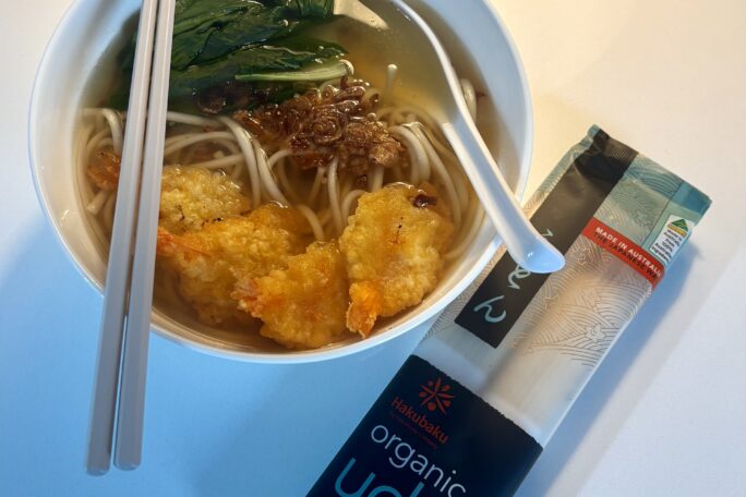 Udon noodle soup with panko prawns and pak choy