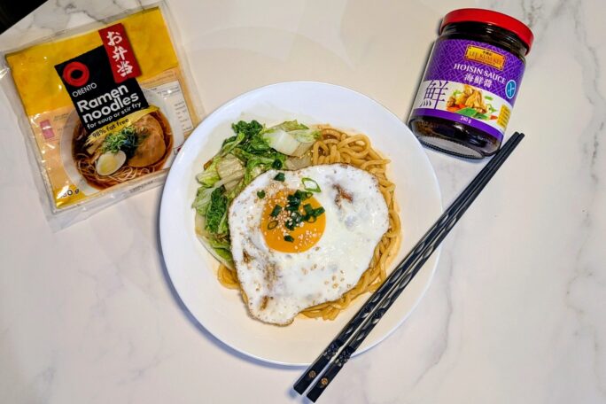 Sticky Hoisin-Peanut Ramen with Crispy Fried Eggs & Chinese Cabbage