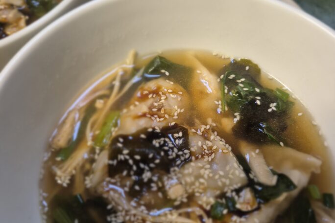 Dumplings soup with ABC sweet soy sauce