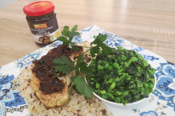 Cauliflower Steak with Black Bean Sauce and Mashed Greens