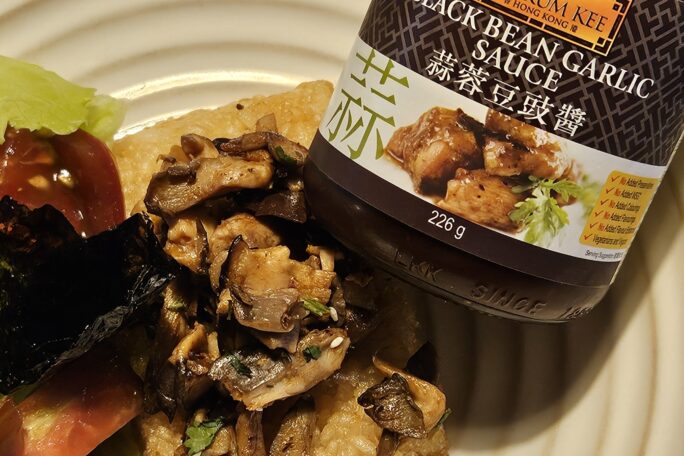 Black bean butter mushroom on crispy rice cakes
