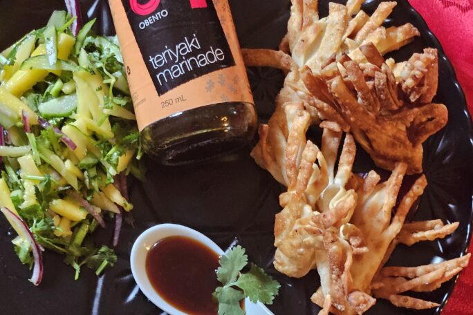 Crunchy Teriyaki Surf‑’n‑Turf Dumplings with Mango‑Cucumber salad
