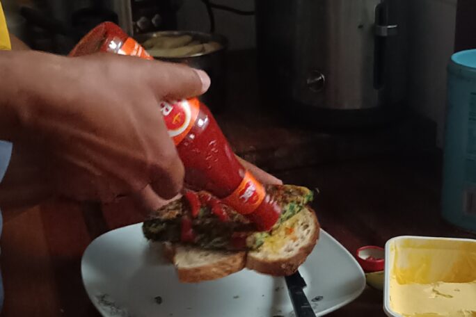 Omlet with spinach, green onion and make extra taste with ABC chilly sauce