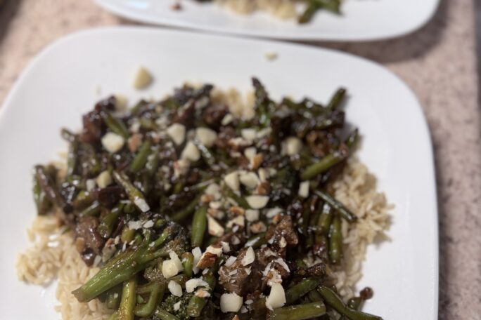 The Mongolian Maverick Fires Steak with Macadamia Crunch