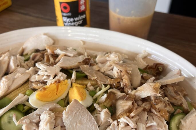 Glass noodle and zoodle poached chicken salad with salty sweet and sour dressing