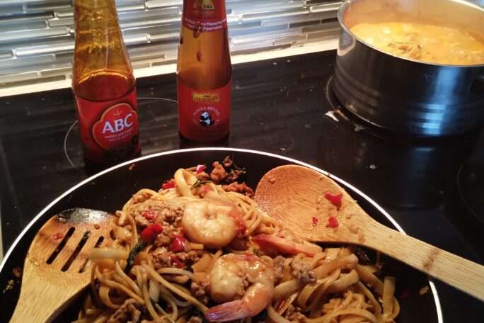 Stir fried basil pork and prawn pasta