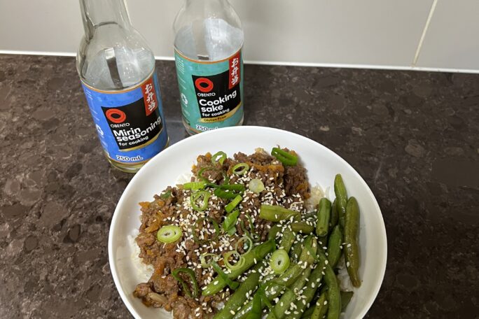 Teriyaki beef bowls with garlic butter rice, green beans